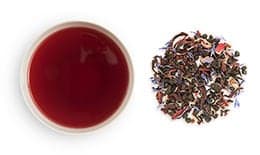 loose groupings and cups of Flavored Fruit Blend Tea
